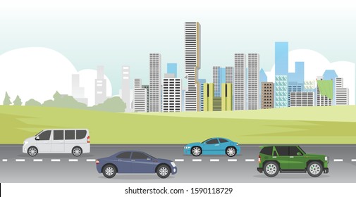 Transportation of car on the road with grass and big city for background.