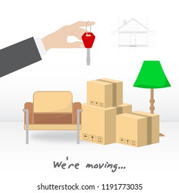 Transportation and home removal. We're moving.  A man's hand with a key for a new house.  Boxes, armchair, lamp, books in anticipation of moving. Stock vector.