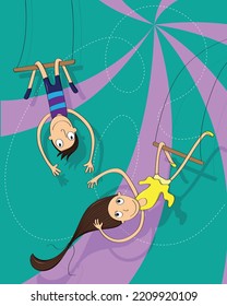 Trapeze artists in a circus show