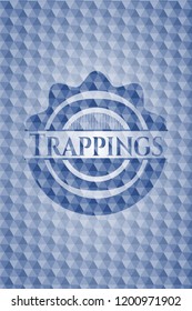 Trappings blue badge with geometric pattern background.