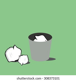 trash bin with crumpled paper.