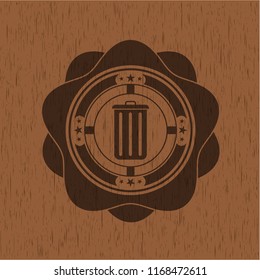 trash can icon inside badge with wood background