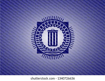 trash can icon inside badge with denim texture
