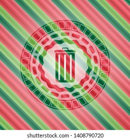 trash can icon inside christmas colors style badge.