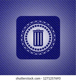 trash can icon inside emblem with jean background