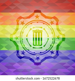 trash can icon inside emblem on mosaic background with the colors of the LGBT flag