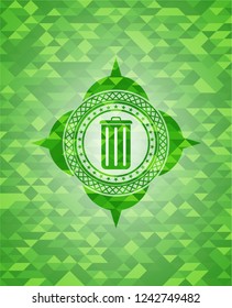 trash can icon inside green mosaic emblem