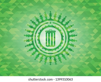 trash can icon inside green emblem with triangle mosaic background