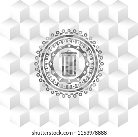 trash can icon inside grey emblem with geometric cube white background