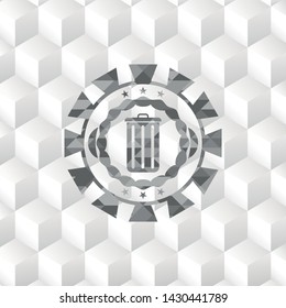 trash can icon inside grey emblem with geometric cube white background