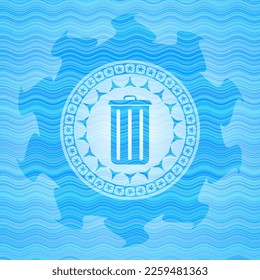 trash can icon inside light blue water wave style badge. 