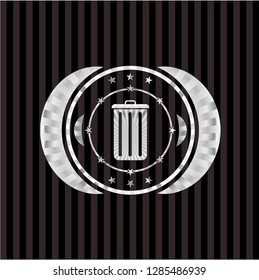 trash can icon inside silver badge or emblem