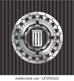 trash can icon inside silver emblem