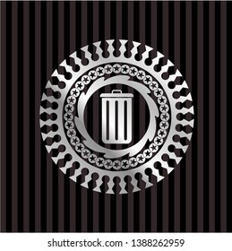 trash can icon inside silver badge or emblem