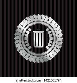 trash can icon inside silvery badge or emblem