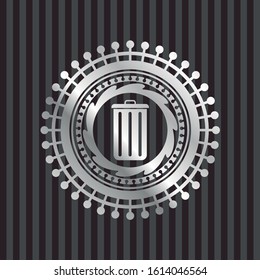 trash can icon inside silvery emblem