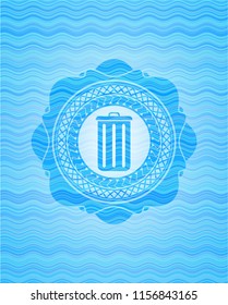 trash can icon inside water wave style badge.