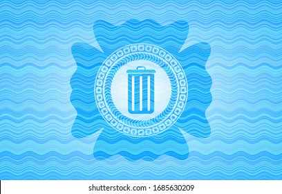 trash can icon inside water wave concept badge.