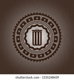 trash can icon inside wood emblem