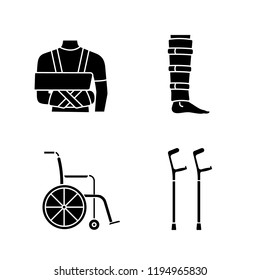Trauma treatment glyph icons set. Shoulder immobilizer, shin brace, wheelchair, elbow crutches. Silhouette symbols. Vector isolated illustration