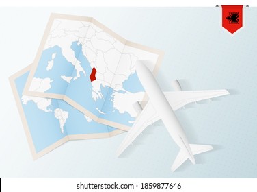 Travel to Albania, top view airplane with map and flag of Albania. Travel and tourism banner design.