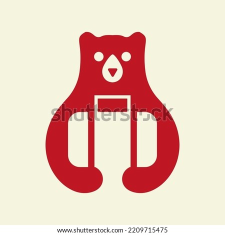 Travel Bag Bear Logo Negative Space Vector Template. Bear Holding Trophy Symbol