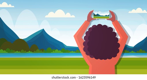 travel blogger using smartphone camera during hiking woman taking photo or video blogging live streaming wanderlust concept mountains landscape background horizontal portrait vector illustration