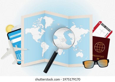 Travel destination Azerbaijan, tourism mockup with travel equipment and world map with magnifying glass on a Azerbaijan. Trip template.