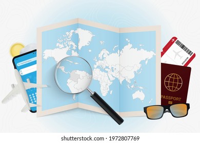 Travel destination Colombia, tourism mockup with travel equipment and world map with magnifying glass on a Colombia. Trip template.