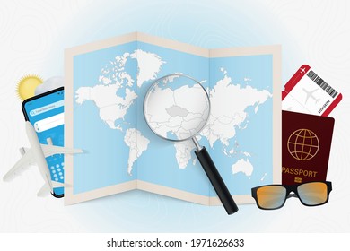 Travel destination Czech Republic, tourism mockup with travel equipment and world map with magnifying glass on a Czech Republic. Trip template.