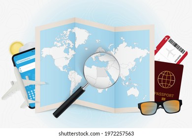 Travel destination Egypt, tourism mockup with travel equipment and world map with magnifying glass on a Egypt. Trip template.