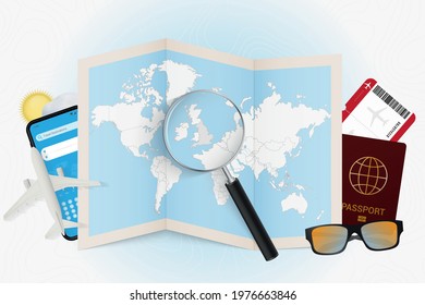 Travel destination England, tourism mockup with travel equipment and world map with magnifying glass on a England. Trip template.