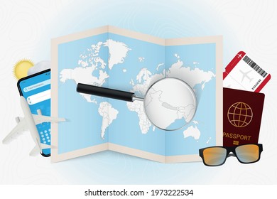 Travel destination Nepal, tourism mockup with travel equipment and world map with magnifying glass on a Nepal. Trip template.