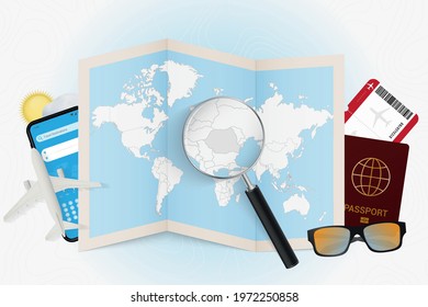 Travel destination Romania, tourism mockup with travel equipment and world map with magnifying glass on a Romania. Trip template.