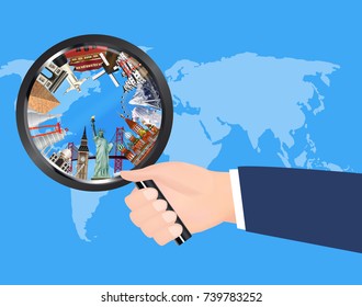 travel landmark in magnifying glass on world map