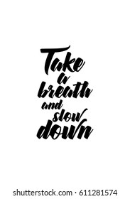 Travel life style inspiration quotes lettering. Motivational quote calligraphy. Take a breath and slow down.