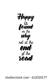 Travel life style inspiration quotes lettering. Motivational quote calligraphy. Happy is found on the way not at the end of the road.