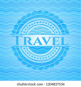 Travel light blue water wave style badge.
