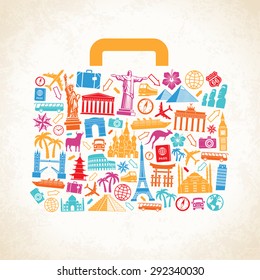 Travel luggage concept composed of travel related and famous monuments icons on a grunge background.