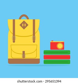 Travel pack set. Backpack, clothes and camera. Yellow isolated backpack on blue background. Flat style vector illustration. 