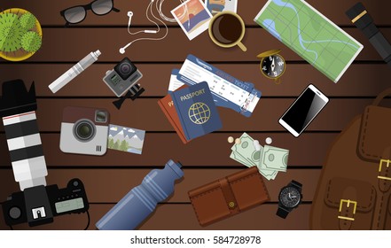 Travel planning banner. Top view with brown table, photo camera, smartphone, passport, earphones, compass, money, map and backpack. Flat design. Vector illustration with clipping mask.