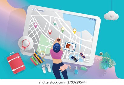 Travel planning concept. Top view on travel, a man preparing, packing checklist, a suitcase, credit card, map,  air ticket, camera, sunglasses, a cup of coffee, passport, tablet with a booking website