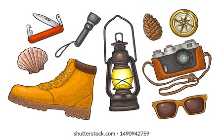 Travel set for outdoor recreation. Boot, gas lamp, photo camera, flashlight, sunglasses, shell, jackknife, compass. Vector engraving vintage color illustration. Isolated on white background