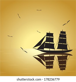 Travel. The ship with a sail in the sea on a gold decline and birds in the sky.