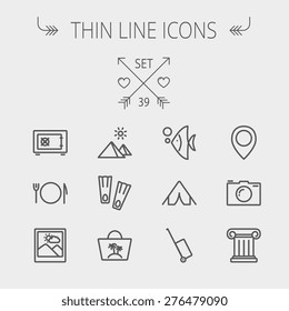 Travel thin line icon set for web and mobile. Set includes- camera wall, pin location, flioppers, fish, bag, table setting icons. Modern minimalistic flat design. Vector dark grey icon on light grey