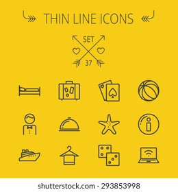 Travel thin line icon set for web and mobile. Set includes- beach ball, waiter, starfish, towel, dice, bed, luggage, laptop, wifi, card, food icons. Modern minimalistic flat design. Vector dark grey