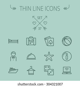 Travel thin line icon set for web and mobile. Set includes- beach ball, waiter, starfish, towel, dice, bed, luggage, laptop, wifi, card, food icons. Modern minimalistic flat design. Vector dark grey