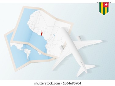 Travel to Togo, top view airplane with map and flag of Togo. Travel and tourism banner design.