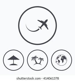 Travel trip icon. Airplane, world globe symbols. Palm tree and Beach umbrella signs. Icons in circles.