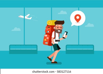 Traveler man using mobile phone in airport.